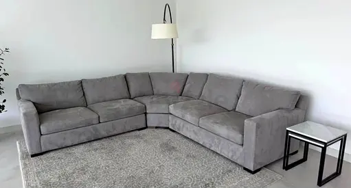 Available high quality crate and barrel corner sofa like new