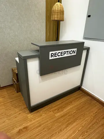 Reception table gray. Sizes mentioned 110*65* 70