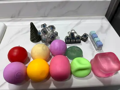 Lot of assorted sensory squishy balls and fidget toys
