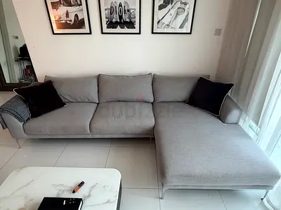 Light grey L-shaped 3-seater sofa with chaise - good condition