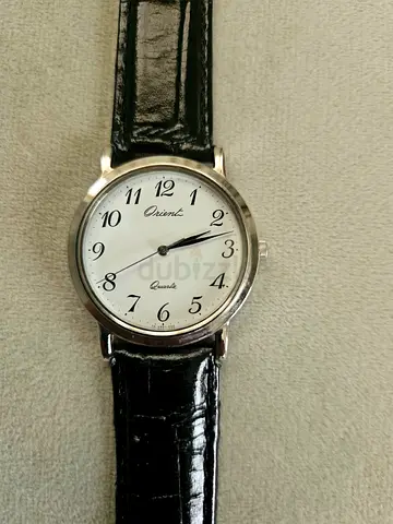 Orient quartz men's dress watch with black leather strap