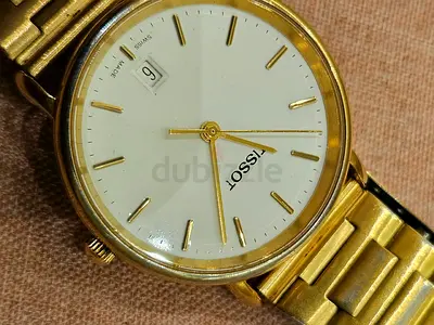Tissot gold-tone men's wristwatch with date - Swiss made