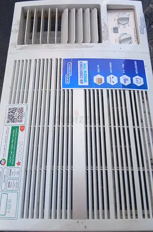 Used window air conditioner unit — functional, needs cleaning