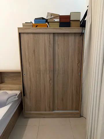 Excellent condition sliding door wardrobe in light oak finish