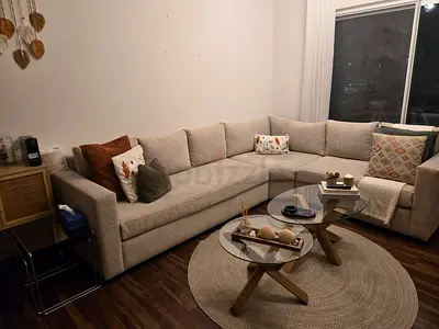 Light beige L-shaped sectional sofa - good condition