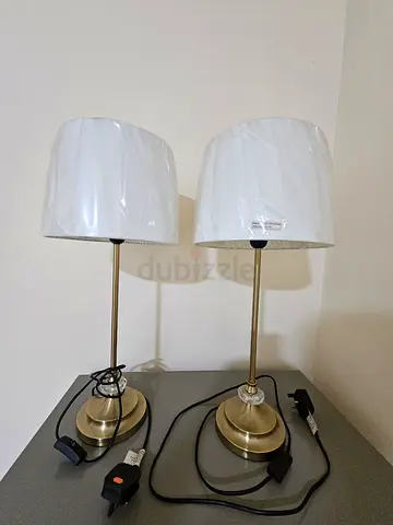 Pair of brass bedside/table lamps with white shades from ikea