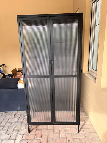 Tall Black Metal Storage Cabinet with Ribbed Glass Doors