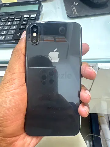 Used iPhone with glass back — good working condition