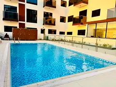 Brand New 1 bedroom apartment with open kitchen gym pool kids play covered parking on prime location