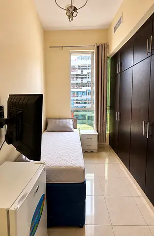 Available new single partition with smart tv and fridge in Sport City