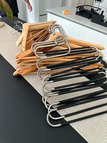 Mixed set of wooden and metal clothes hangers - about 20 pieces