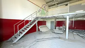Warehouse for rent in Ind 11, Sharjah. 1,000 sqft ground + 500 sqft mezzanine. 12kW power. 4 cheques