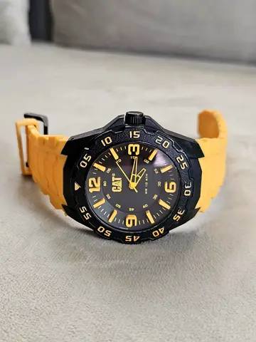 CAT branded men's sport watch with yellow silicone strap