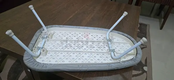 Iron stand ,can be used on bed/ table/ small plave utility Foldable, Padded, Grey. Very practical