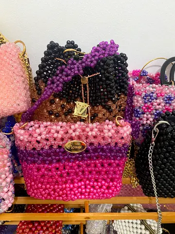 Luxurious pink handmade floral beaded bag