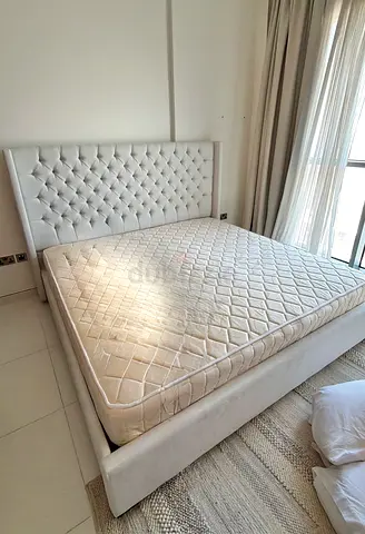 Beige upholstered super king-size bed frame with mattress (good condition)