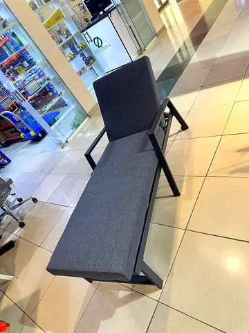 Modern grey lounge chair/chaise with metal frame