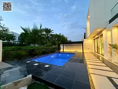 Corner villa in Al-Zoura, modern style, 4 master bedrooms, garden, swimming pool and barbecue area,