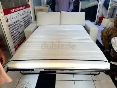 Convertible 2 seater sofa bed in light beige - good condition vimle