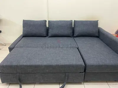 Grey L-shaped Sofa Bed with Storage - Good Condition