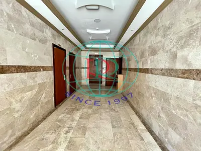 2 BR HALL FLAT WITH SPLIT DUCTED A/C AVAILABLE IN AL YARMOOK AREA NEAR NESTO HYPERMARKET