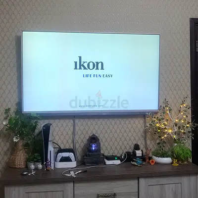 Ikon 55 inch" Flat Panel LED TV mounted with remote and cables (good condition)