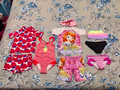 All for 60 AED only Branded beautiful Swimming wear for girls 4-7 years old can fit Perfect conditio