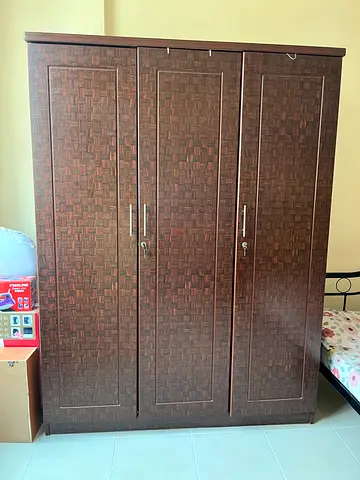 Dark wood 3-door wardrobe with lock — good condition all items are in very good condition