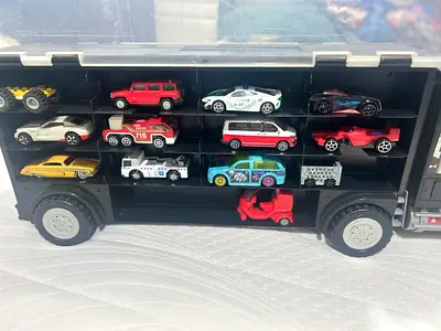 Hot wheels Toy car carrier truck with 12 assorted die-cast cars