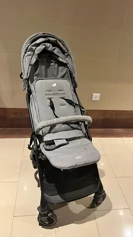 Lightweight grey baby stroller in good condition