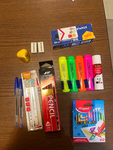 Used stationery bundle — pens, pencils, highlighters, erasers, ruler, crayons