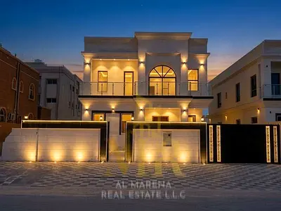 Luxury Villa for Sale in Al Rawda 3 – Ajman | First Occupant | Stone Facade | Land Area: 5,700 sq. ft. | 5 Master Bedrooms | Freehold Ownership
