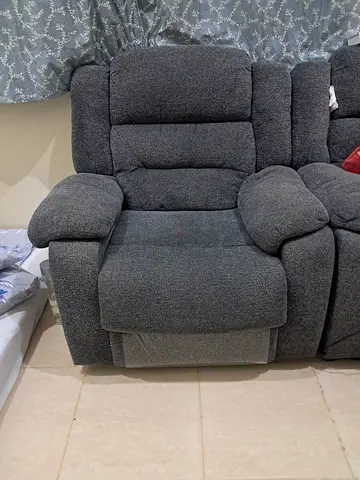 Comfortable single grey fabric recliner chair - good condition
