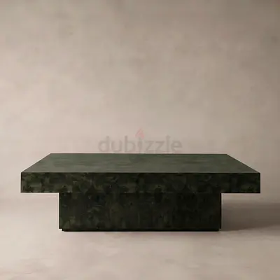 Solid dark green rectangular coffee table with pedestal base