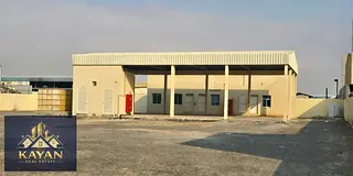 Industrial land for rent in Umm Al Quwain, 29,000 sq. ft with office, staff rooms & 35 kW power.