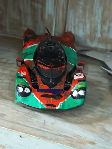 Hand-painted small toy race car - used