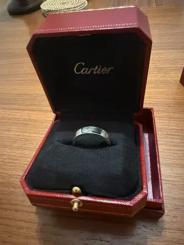 Cartier band ring in original box — pre-owned, good condition, size 64