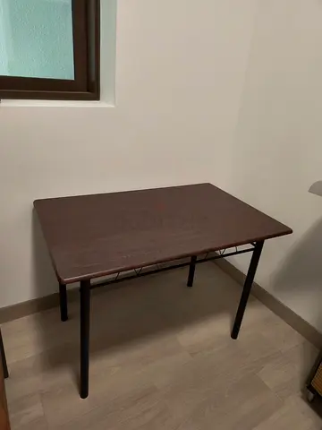 Compact wooden study table with metal legs — good condition