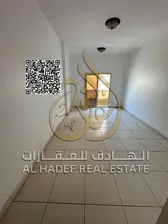Two-bedroom apartment with a living room in Naeimiya 2, two bathrooms, balcony, and master bedroom w