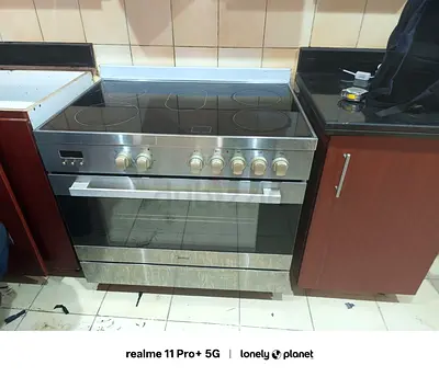 Stainless steel electric range with ceramic hob and oven