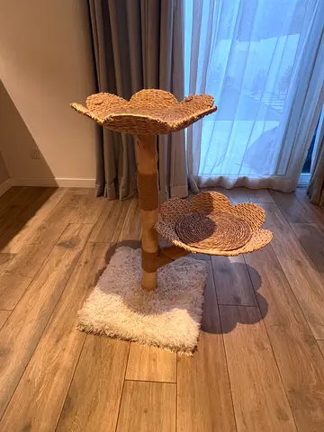 Natural wood and wicker cat tower