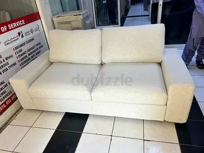 Light beige fabric sofa bed- good condition