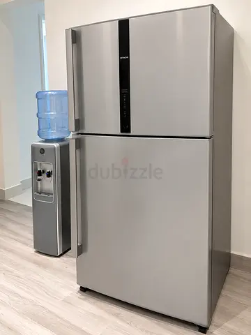 Silver double-door refrigerator - good condition