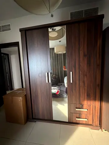 Large dark wood wardrobe with mirror and drawers from Home Center - excellent condition