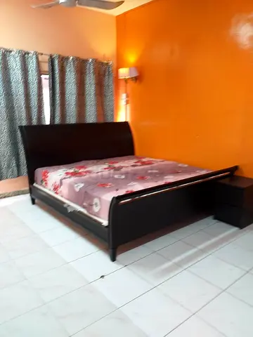 Used dark wood queen bed frame with mattress and bedside tableHand made wood