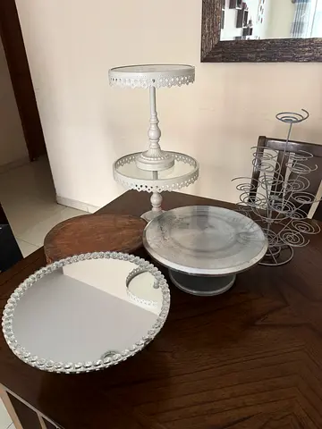 Set of decorative white mirrored cake stands and trays