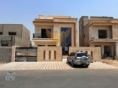 **فيلا فاخرة مودرن للبيع في الحليو 2 - عجمان | شاملة الرسوم وطابقين مع روف