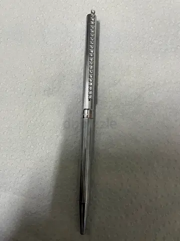 Silver metal ballpoint pen with decorative clip - preowned