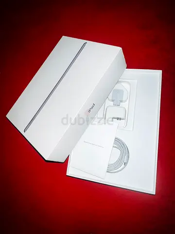 iPad original box with charger, cable and manuals - unused condition