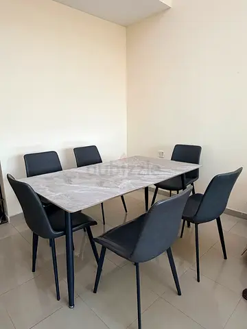 Modern Dining Table with 6 chairs - 1 yr old.